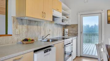 Fridge, stovetop, dishwasher, coffee/tea maker