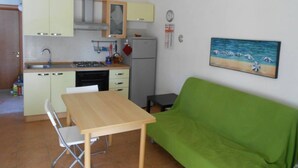 Apartment, 2 Bedrooms, Smoking, Patio | Living area - Appartamento pt in Villa Falari - Clima - Wi-fi (Avola)