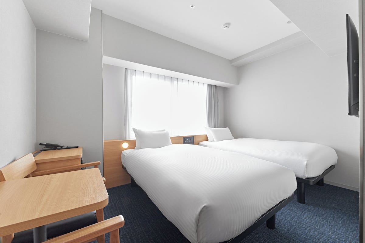 Twin Room, Non Smoking | Down comforters, desk, blackout drapes, soundproofing