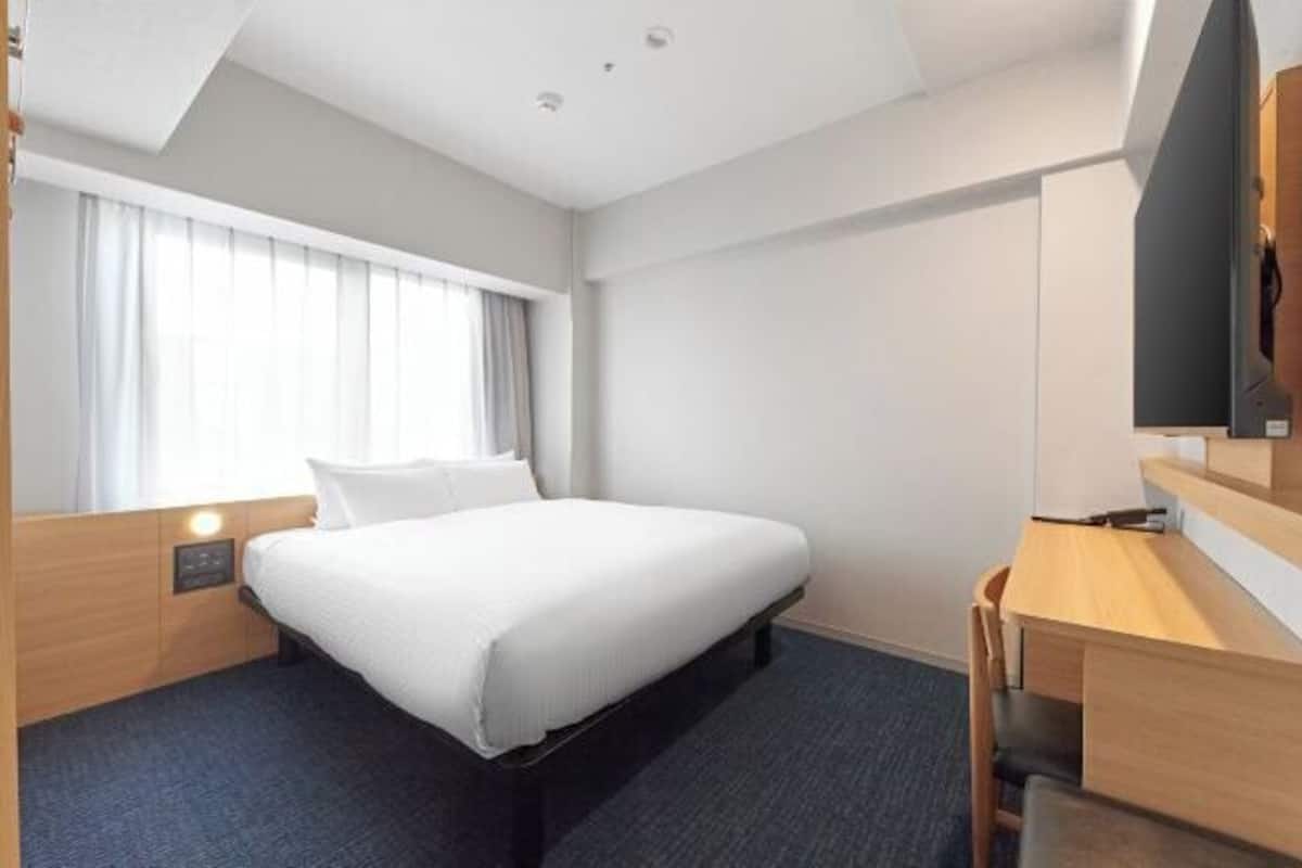 Down duvets, desk, blackout curtains, soundproofing