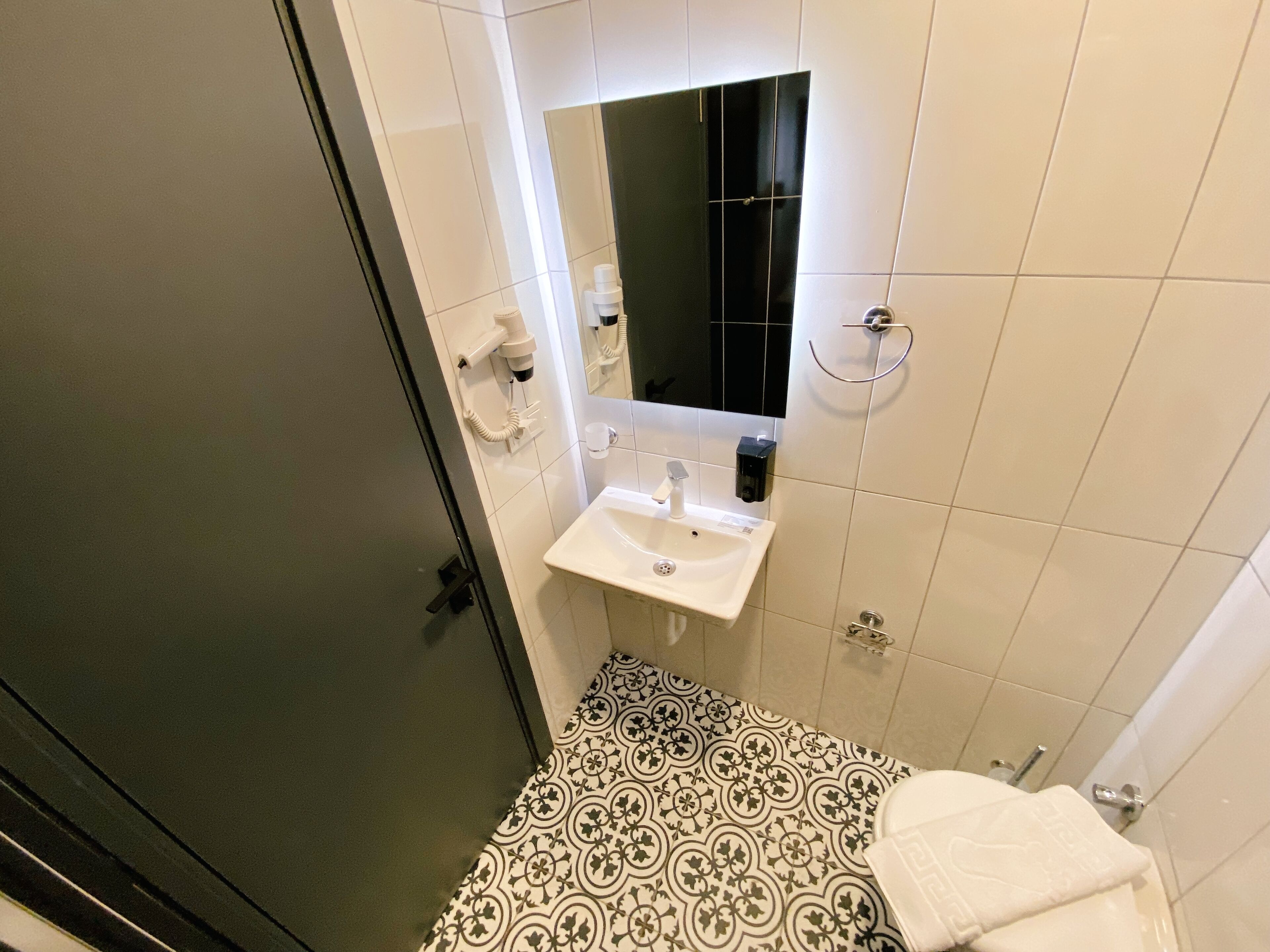 standard double room | bathroom | shower, hair dryer, slippers, towels