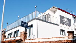 A hotel building with a sign reading "NEFIS HOTEL CITY". - Nefis Hotel City (Fethiye)