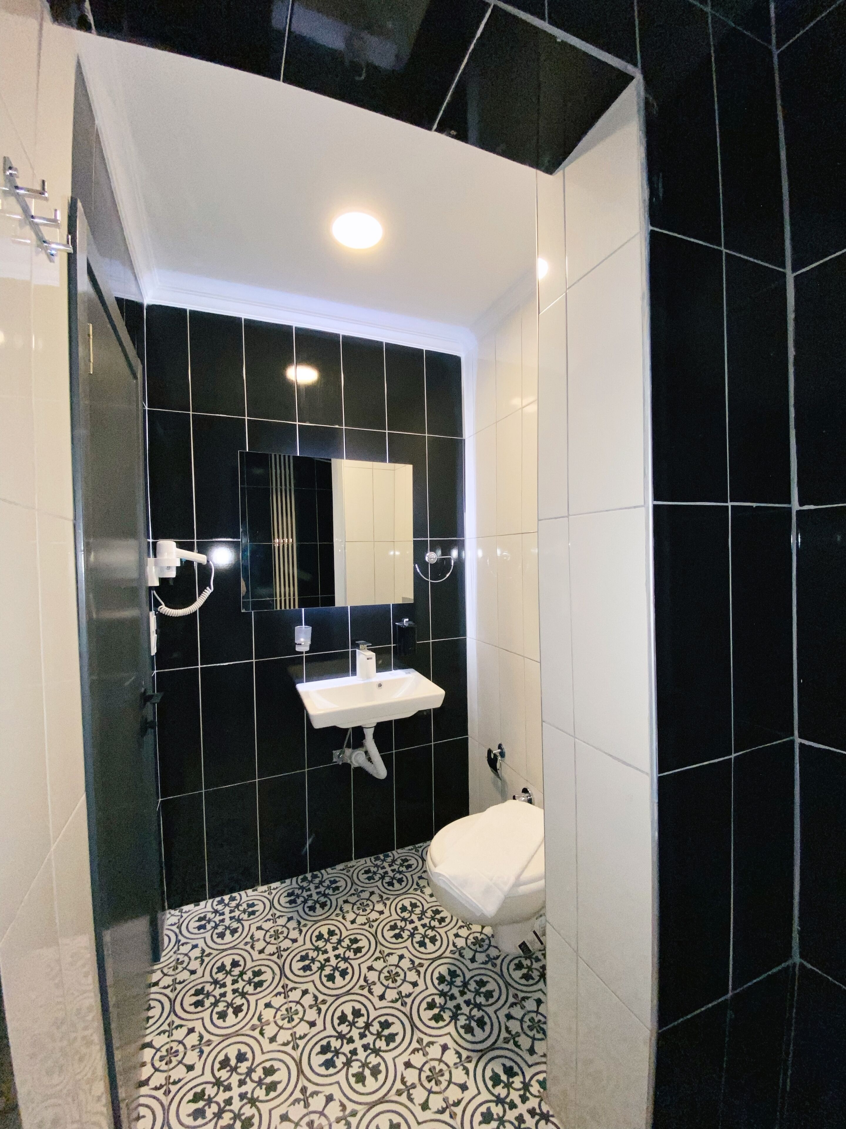 economy double or twin room | bathroom | shower, hair dryer, slippers, towels