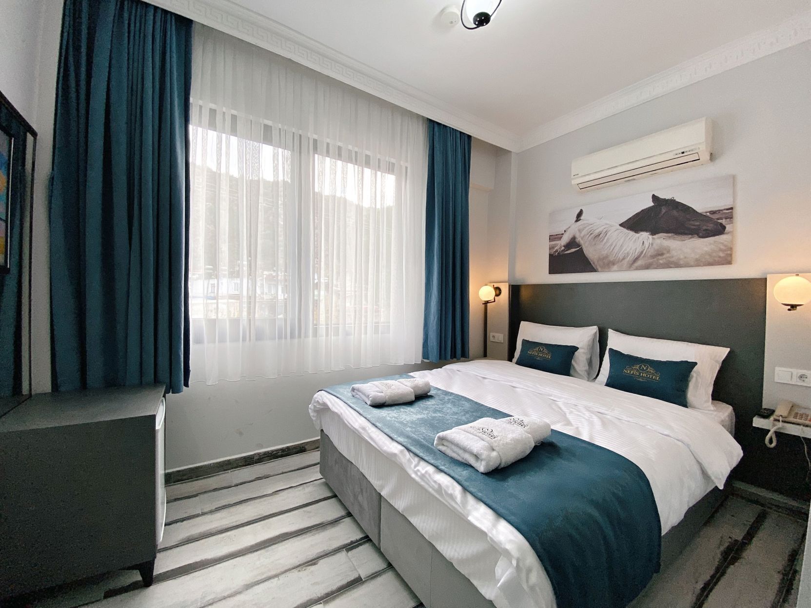 Coffres-forts dans les chambres, Wi-Fi gratuit, draps fournis