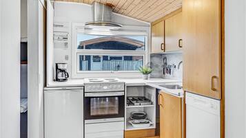 Fridge, stovetop, coffee/tea maker