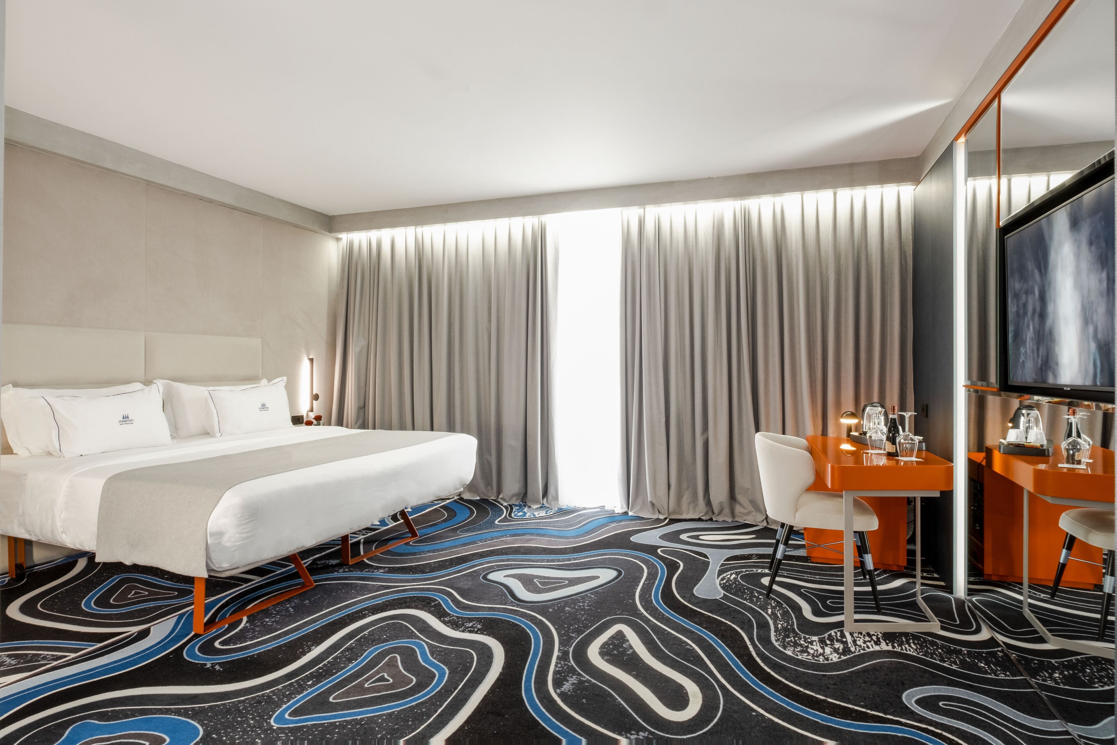 Premium bedding, memory-foam beds, minibar, in-room safe