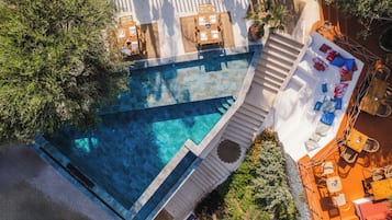 2 outdoor pools, open 8:00 AM to 8:00 PM, pool cabanas (surcharge)