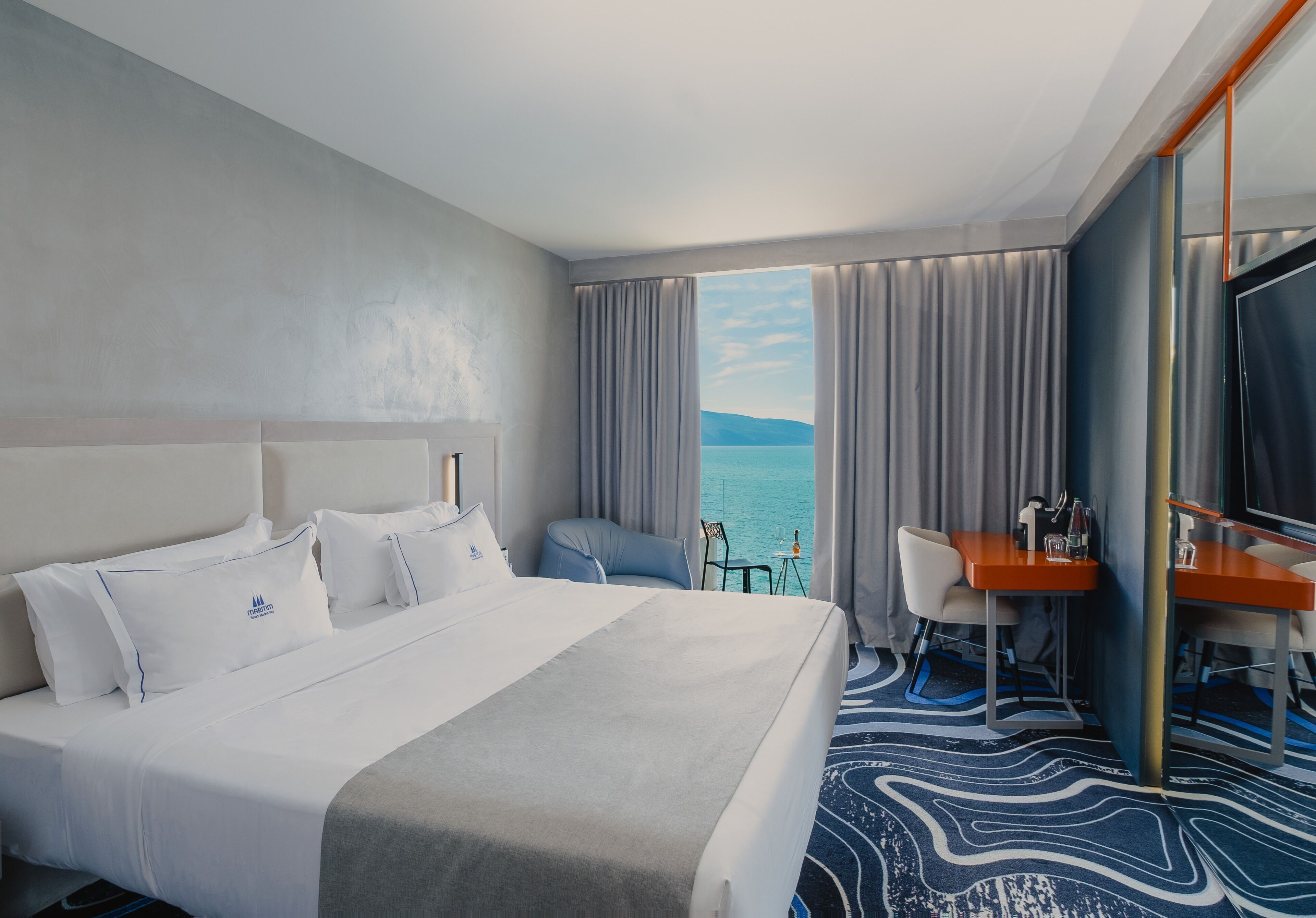 Premium bedding, memory-foam beds, minibar, in-room safe