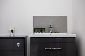 Shower, free toiletries, hair dryer, towels
