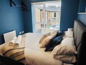 Casa City | 3 dormitorios, tabla de planchar con plancha, wifi gratis y ropa de cama