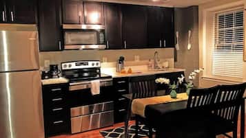 Microwave, dishwasher, coffee/tea maker, cookware/dishes/utensils