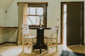 Traditional Chalet, 1 Queen Bed | Living area | Fireplace - Villa Chalés Gramado - OH HOTEIS (Gramado)