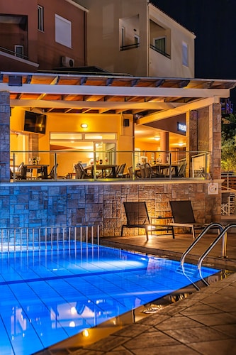 Theos village apartments