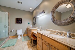 Combined shower/bathtub, towels, soap, toilet paper