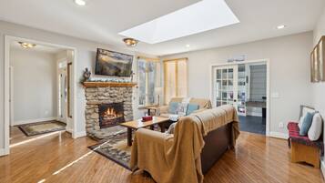 Smart TV, fireplace, books