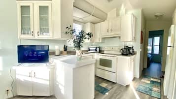 Microwave, coffee/tea maker, cookware/dishes/utensils