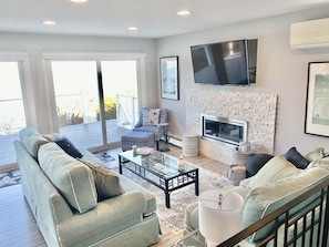 Smart TV, fireplace, books