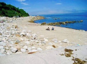 Plage à proximité, chaise longue, serviettes de plage