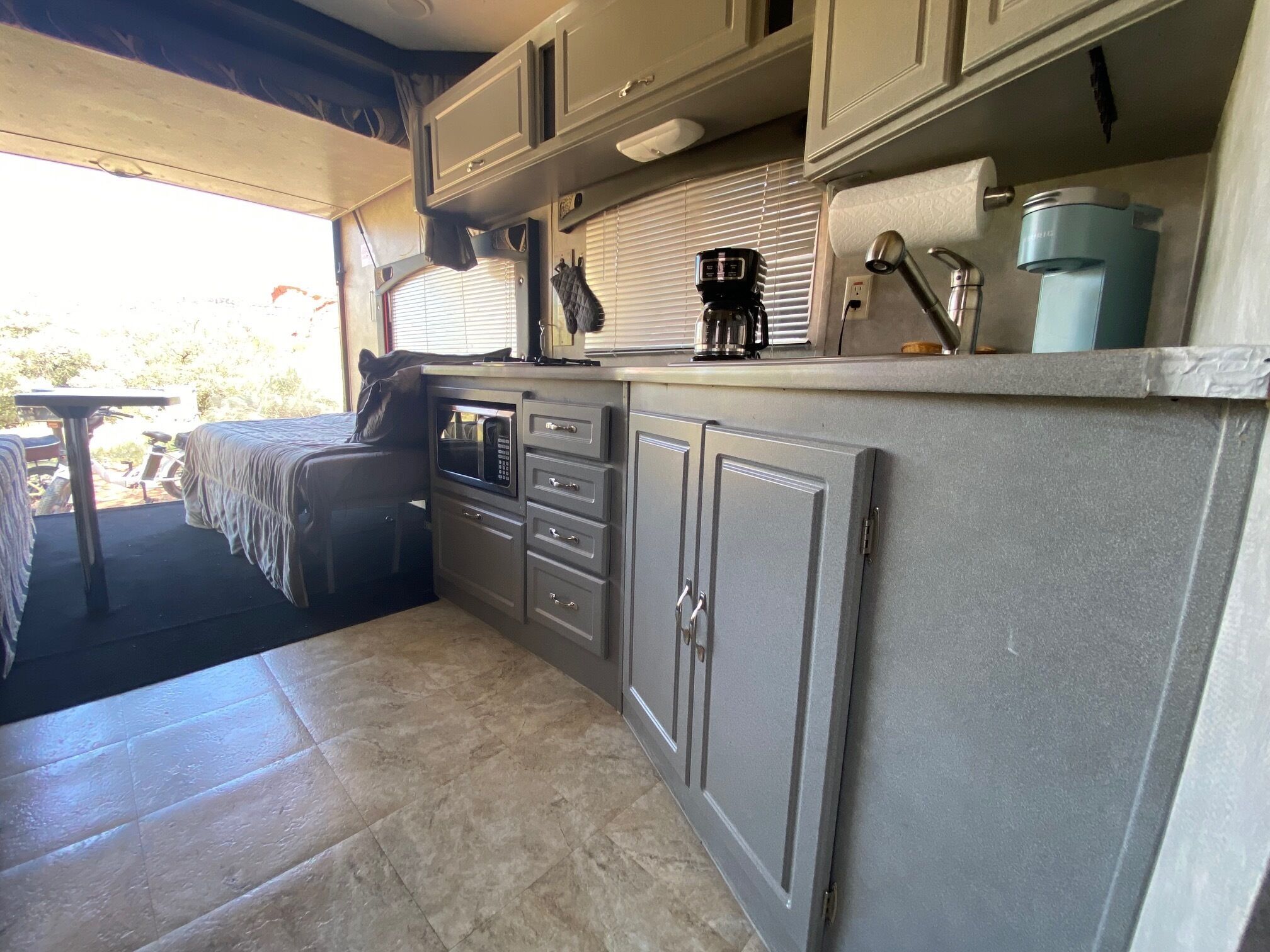 Fridge, microwave, stovetop, coffee/tea maker