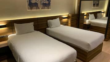 Habitación con 2 camas individuales | 1 dormitorio, ropa de cama de alta calidad, sistema de insonorización