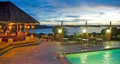 The Golden Sunset Villa on a resort with beach access
