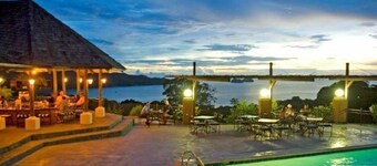 The Golden Sunset Villa on a resort with beach access