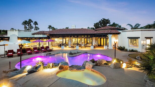 A resort with a swimming pool, outdoor seating, and a covered patio area. - Saguaro Estate - .3 Acre Private Paradise (La Quinta)