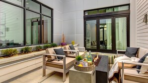 A modern outdoor patio with a sofa, chairs, a table, and a fire pit. - Unbeatable Location, Hot Tub, Luxury Amenities & Year-Round Recreation! Park City Parkite 35 (Park City)