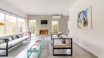 Smart TV, fireplace, DVD player, foosball