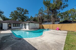 Outdoor pool, a heated pool - The Paris- Colorful 3BEDROOM 2BATH SFH w/Heated POOL Available  (Houston)
