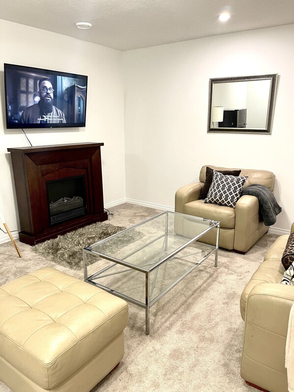 Living area - Luxury 1- bedroom secondary suite close to Airport. (Calgary)