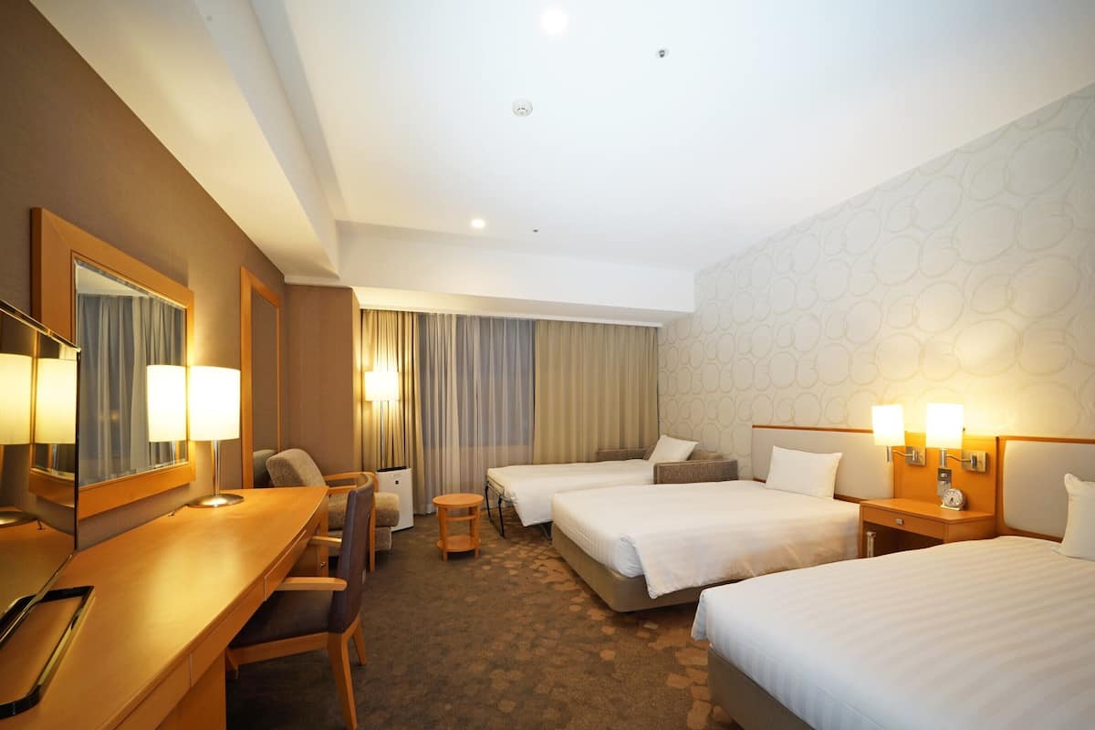 Premium bedding, down duvets, blackout curtains, free WiFi