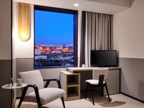 Premium bedding, down duvets, blackout curtains, free WiFi