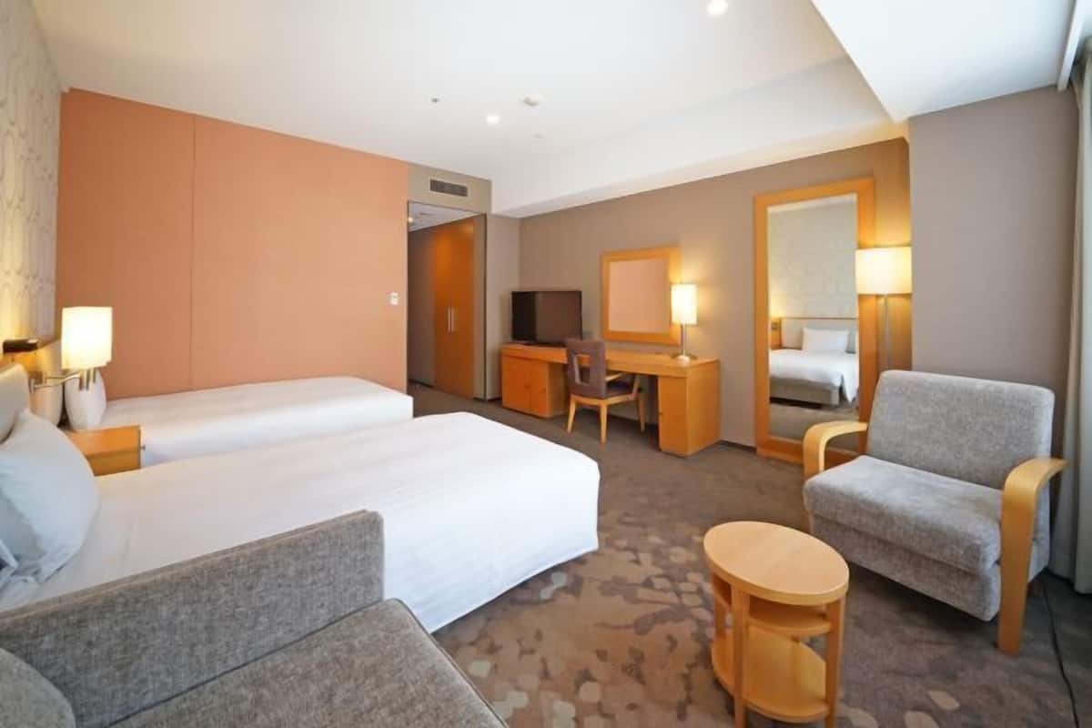 Premium bedding, down duvets, blackout curtains, free WiFi