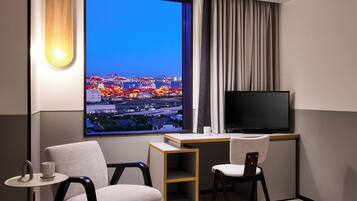 Premium bedding, down comforters, blackout drapes, free WiFi