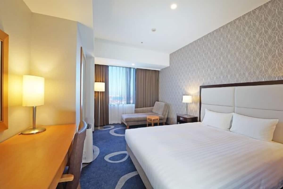 Premium bedding, down duvets, blackout curtains, free WiFi