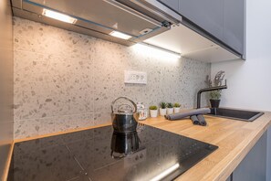 Standard Apartment, Multiple Bedrooms, 2 Bathrooms (Pool Apartment Sapore Di Mare 1) | Private kitchen | Fridge, oven, stovetop, dishwasher