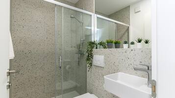 Shower, towels, soap, shampoo