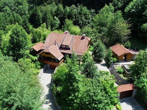 Carpenters Dream House with a garden and swimming pool