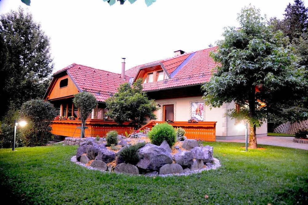 Carpenters Dream House with a garden and swimming pool