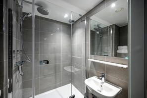 Shower, rainfall showerhead, free toiletries, hair dryer