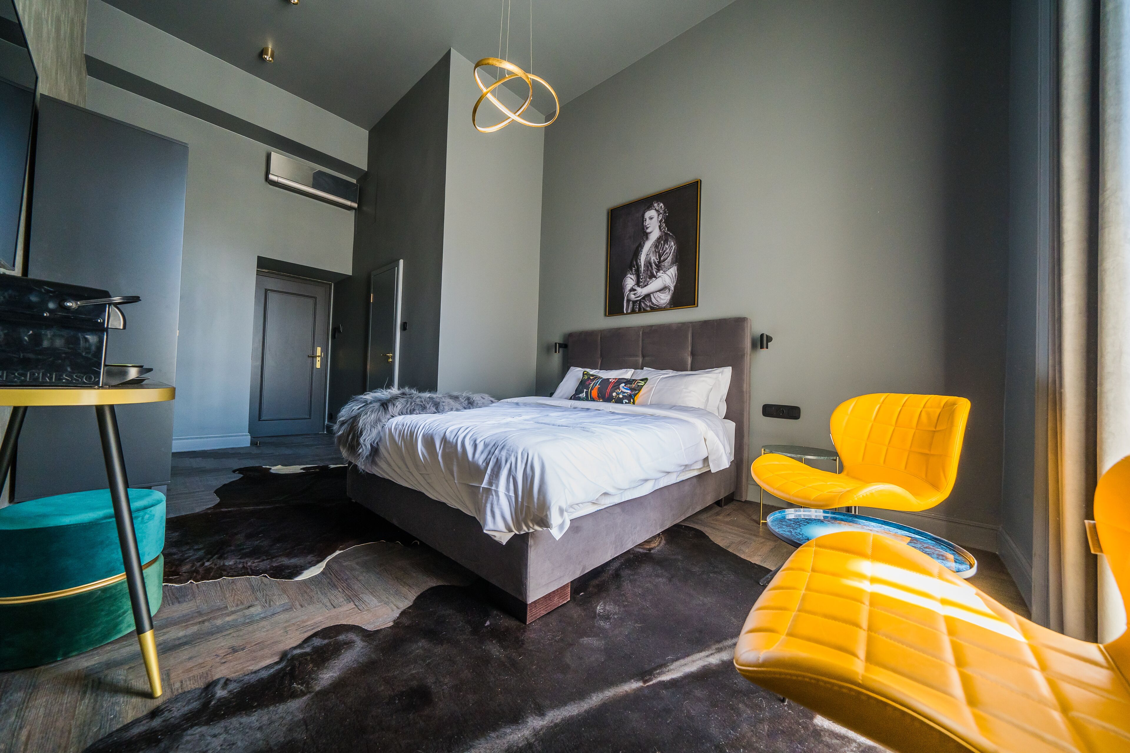 deluxe double room | minibar, in-room safe, individually decorated, desk