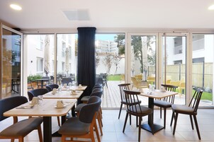 Daily buffet breakfast (EUR 18 per person)