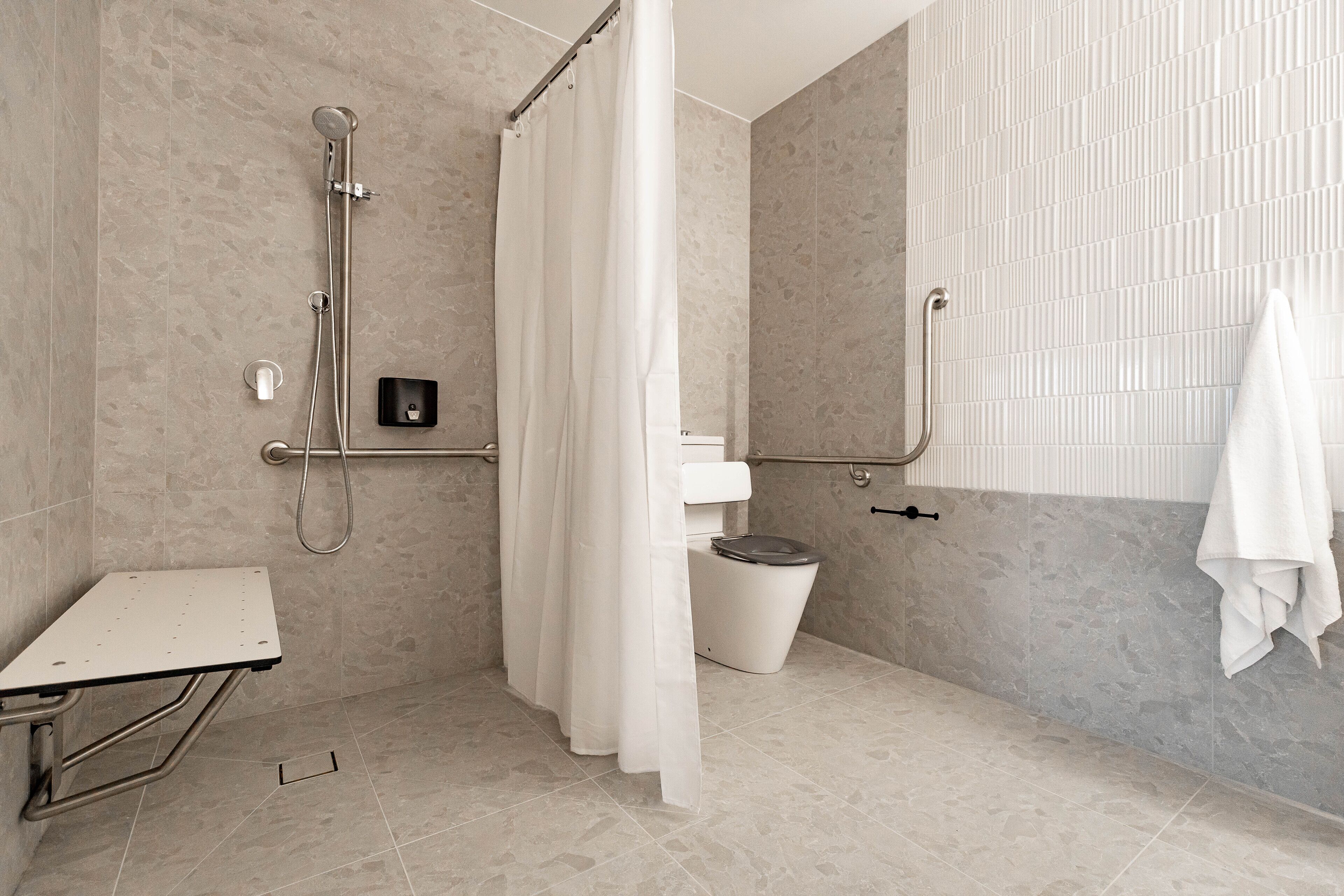 accessible queen room | bathroom | shower, rainfall showerhead, free toiletries, towels