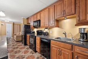 Fridge, microwave, oven, stovetop - Direct Ocean Views From this 2 Bedroom Sea Terrace Condo with Outdoor Pool! (Ocean City)