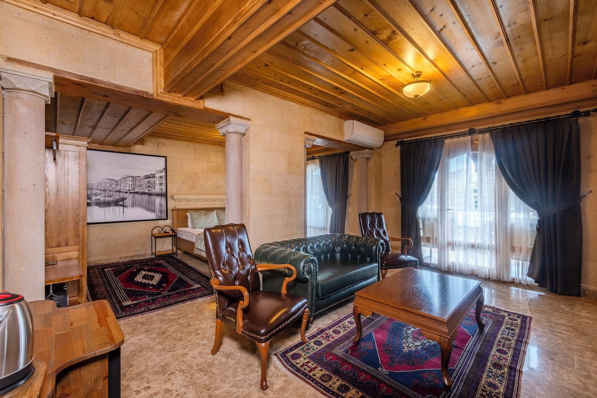 Stone Cratus Premium Suite | Sengetøy av topp kvalitet, minibar og safe på rommet