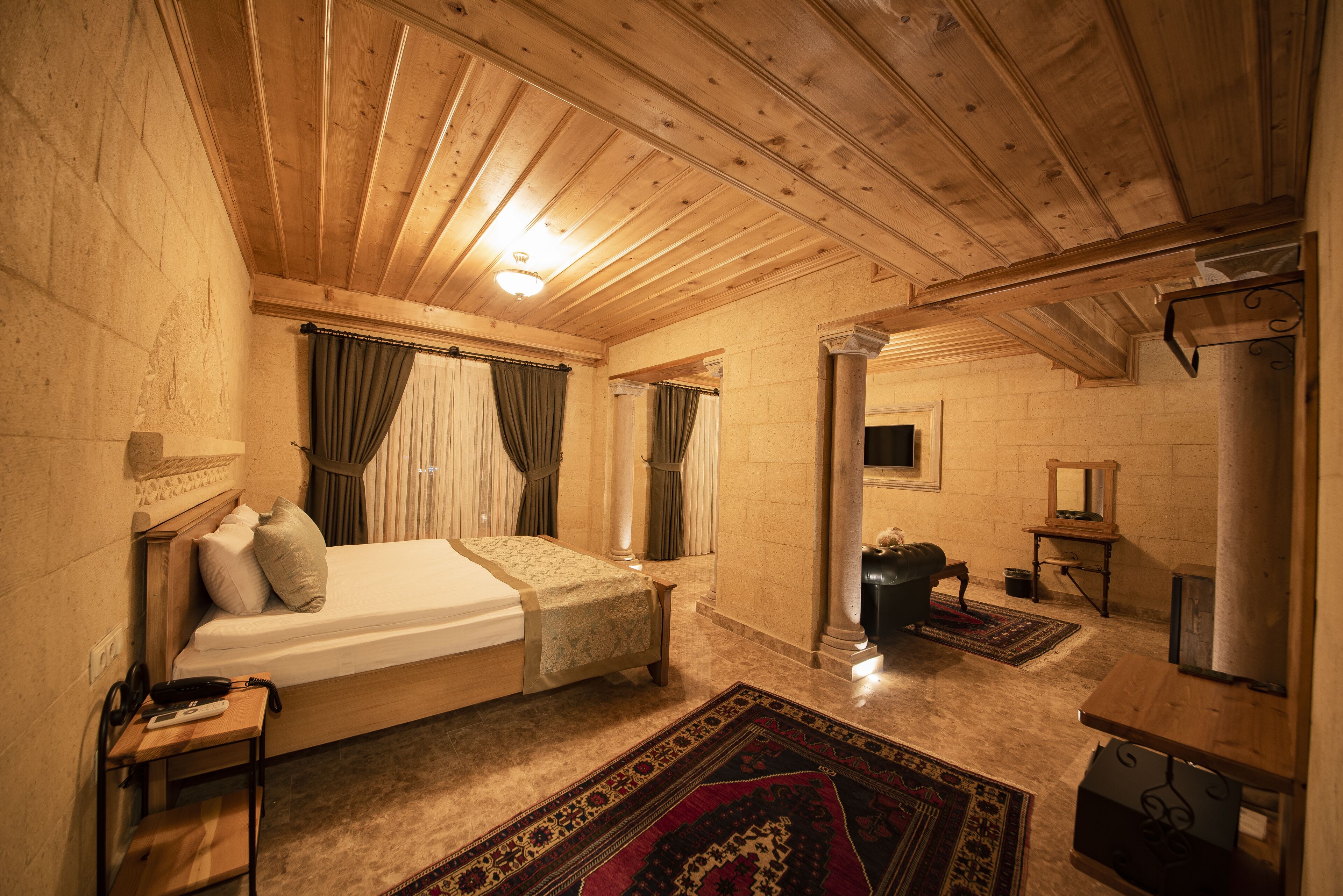 Stone Cratus Premium Suite | Premium bedding, minibar, in-room safe, individually decorated