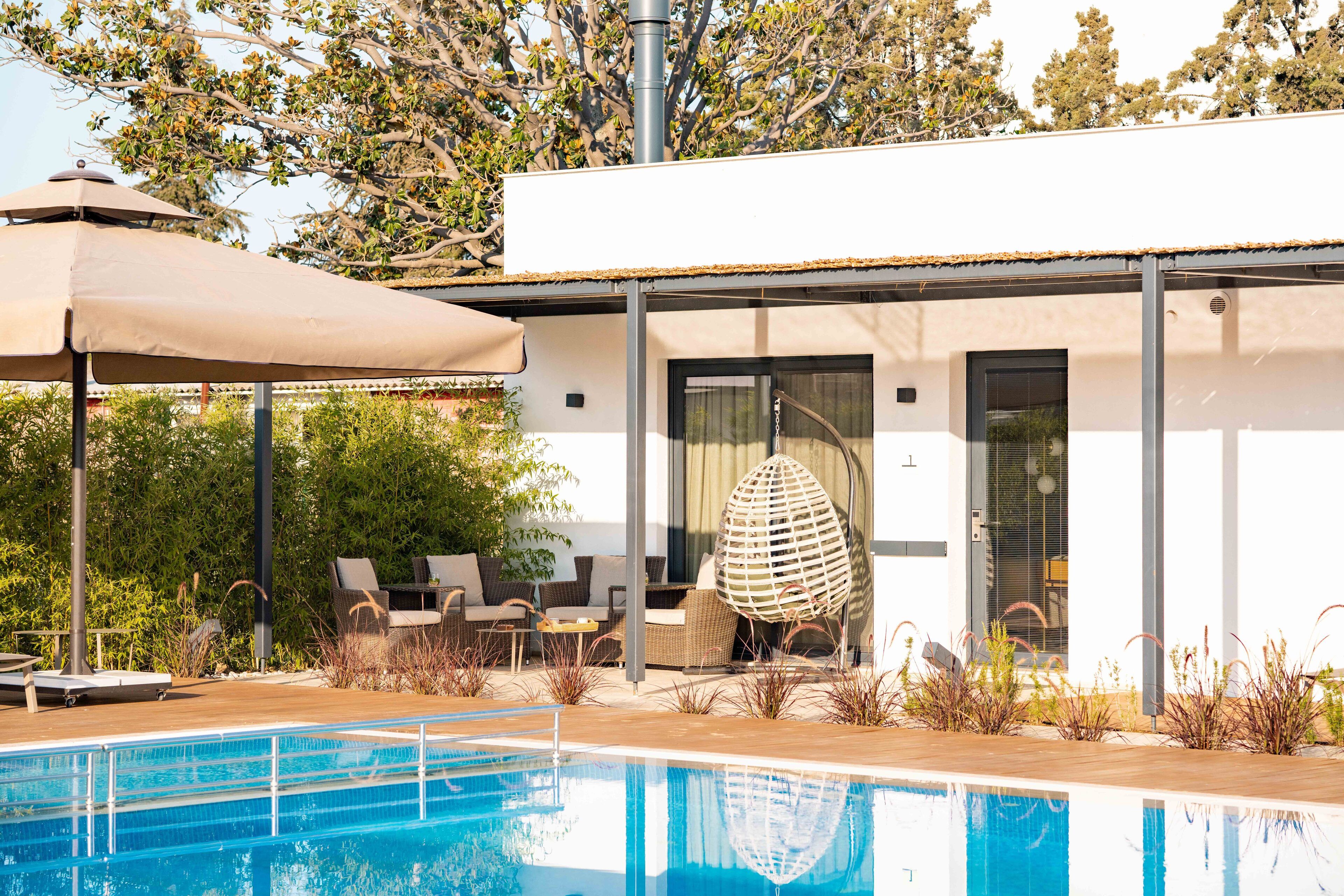 Familievilla, 2 soverom | Minibar, skrivebord for bærbar PC og strykejern/-brett