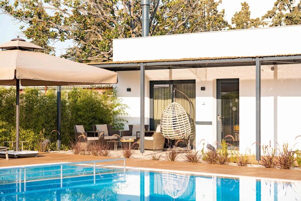 Familienvilla, 2 Schlafzimmer | Minibar, laptopgeeigneter Arbeitsplatz, Bügeleisen/Bügelbrett