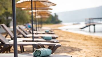 Private beach, sun-loungers, beach umbrellas, beach towels